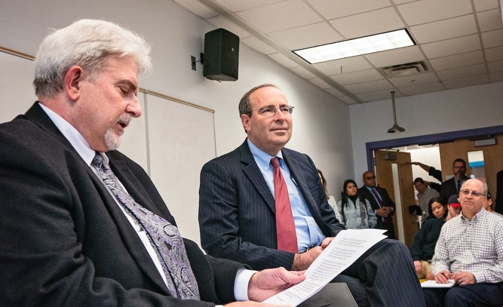 ECU's James Kleckley in classroom setting, moderating discussion with students