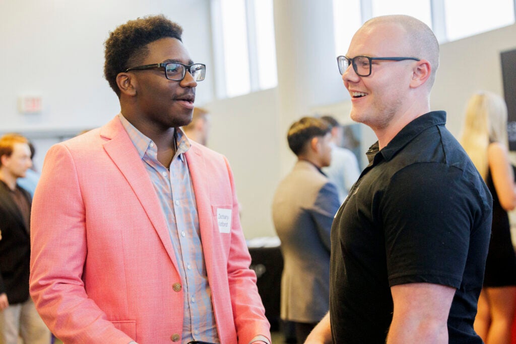 Zachary Watford and another attendee at annual Meet the Firms