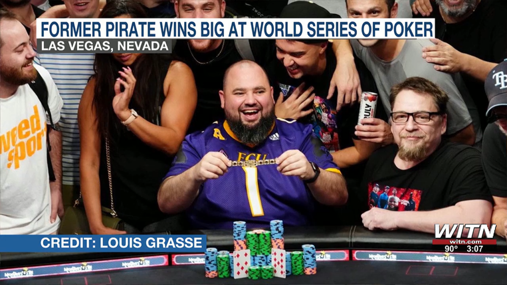 Chris Hunichen holds world series of poker bracelet 